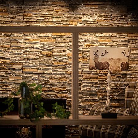 Home-Hotel Salzberg ベルヒテスガーデン エクステリア 写真 A stone wall